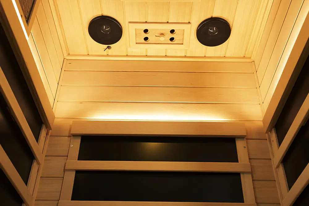 Wizzisaunas S01 infrared sauna with warm backlights on side and bottom panels