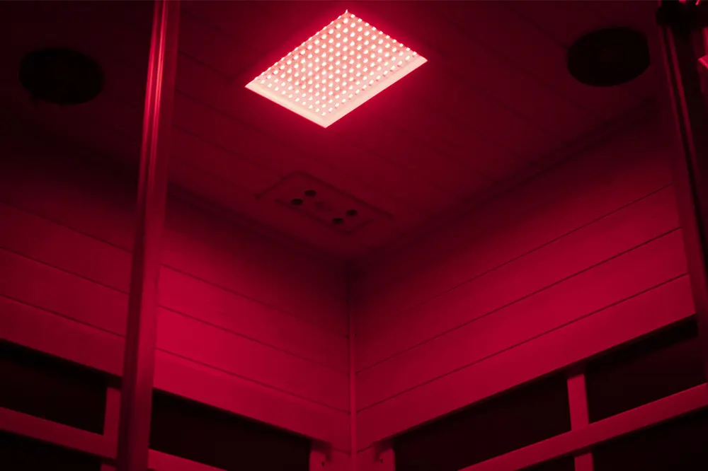 Medical grade red and blue light therapy lamps in Wizzisaunas S07 full-spectrum infrared sauna for pain relief and skin rejuvenation.