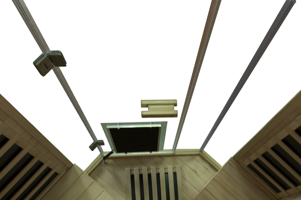 Pentagon-shaped Wizzisaunas S07 infrared sauna with large tempered glass panels for a modern, open-view design.