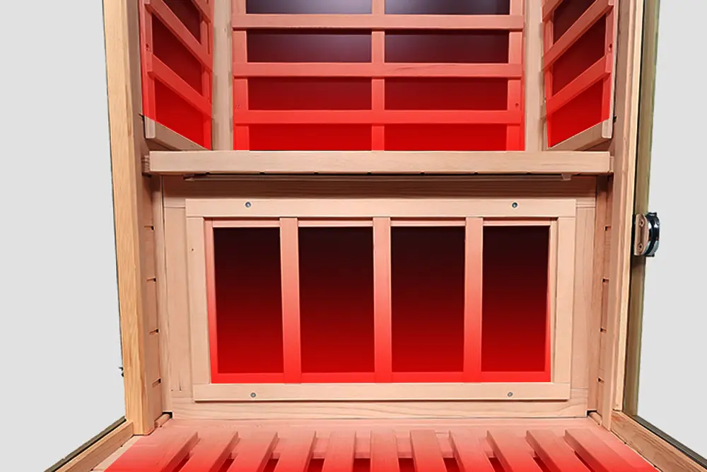 Five visible far nfrared heating panels inside Wizzisaunas sauna, with a sixth heater on the glass door for full 360-degree heat coverage
