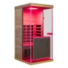 Wizzisaunas 909MRX infrared sauna with red lights on, highlighting its sleek design and warm, illuminated interior.