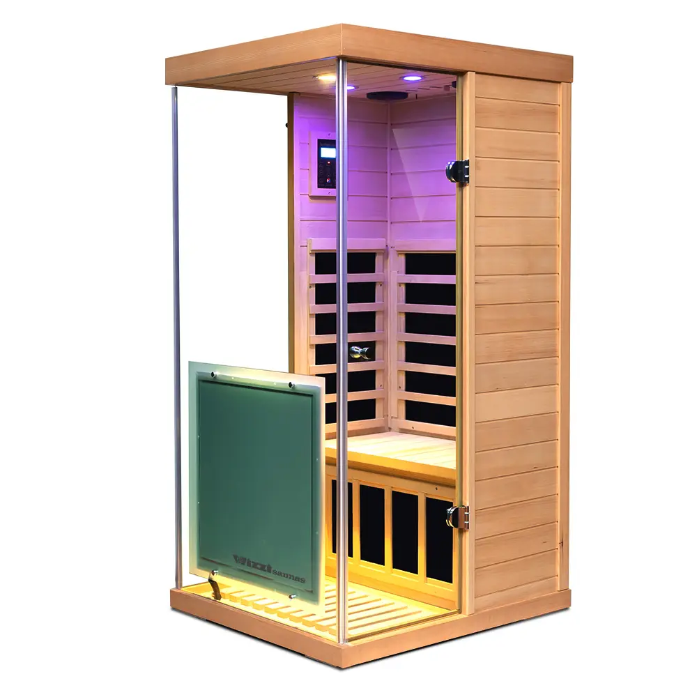 Wizzisaunas 909MHX infrared sauna 45° side view with pink chromotherapy lights and yellow reading light on, highlighting a vibrant and relaxing interior.