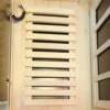 Infrared sauna foot heater panel component showing heating elements and wooden cover for even heat distribution and comfort.