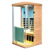 Wizzisaunas 909MHX infrared sauna 45° side view with color lights on, featuring a bench with backrest and towel, highlighting a cozy and inviting interior.