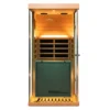 Front view of the Wizzisaunas 909MHX infrared sauna with wall lights, yellow lights, and reading lights on, showcasing the illuminated interior and modern design.